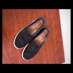 Black and white toms slipons